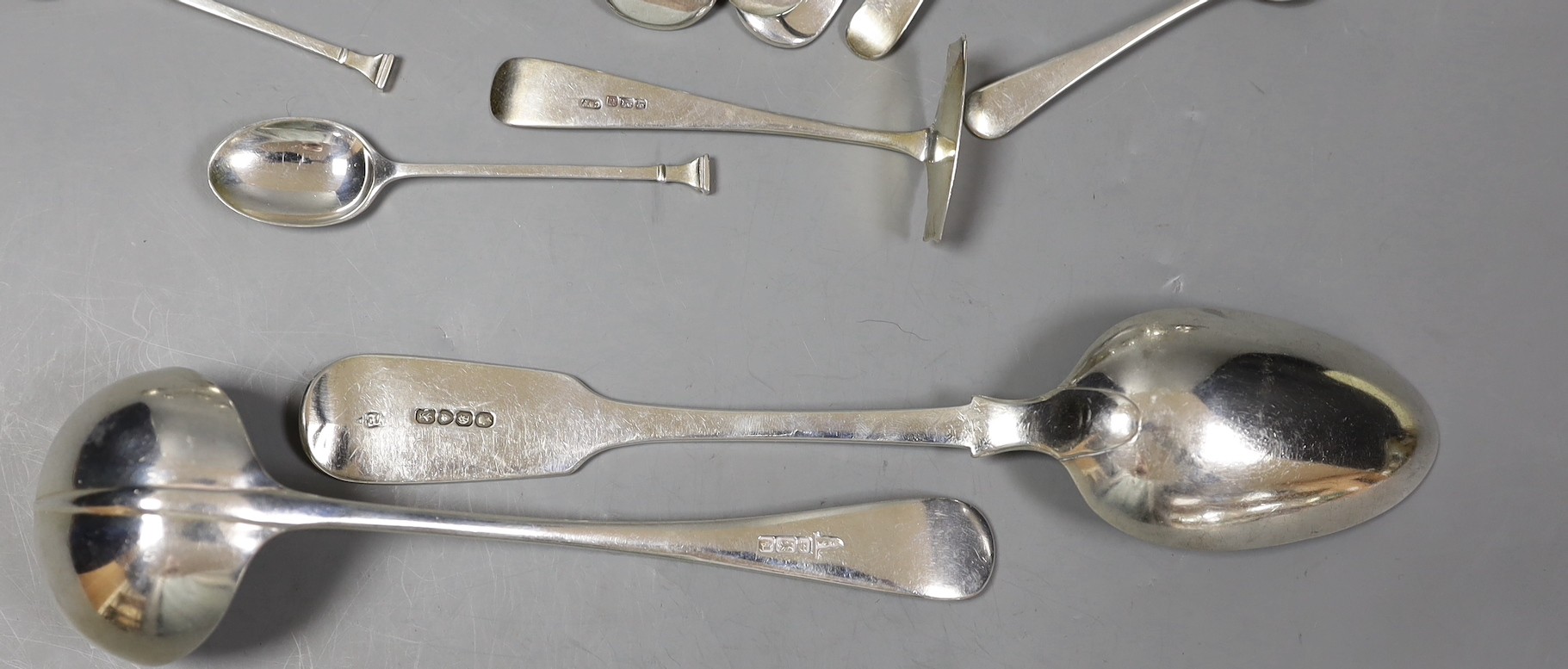 A pair of early Victorian silver fiddle pattern table spoons, William Eaton, London, 1840, a pair of later silver rat-tail sauce ladles by Walker & Hall, Sheffield, 1902 and a small quantity of assorted minor silver flat